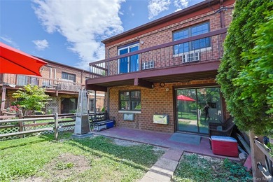 Welcome to this fully renovated 2-Family Condo Townhouse located - photo 3