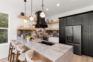 Experience the perfect blend of modern luxury and coastal charm - photo 9