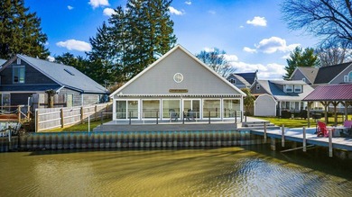 Experience the ultimate waterfront oasis in this masterfully - photo 2