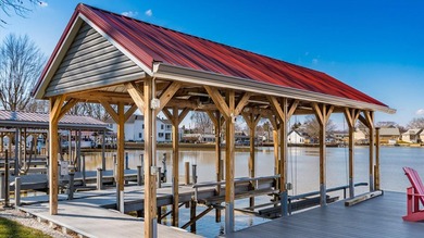 Experience the ultimate waterfront oasis in this masterfully - photo 4