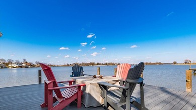 Experience the ultimate waterfront oasis in this masterfully - photo 5