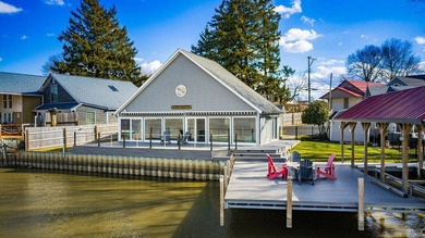 Experience the ultimate waterfront oasis in this masterfully - photo 7