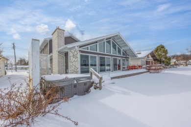 Lake Home For Sale in Canadian Lakes, Michigan