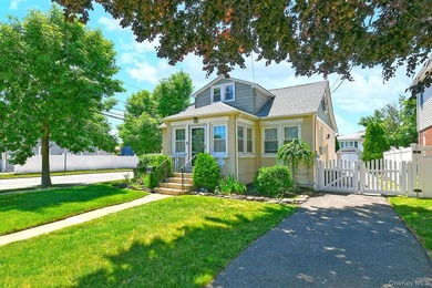 Welcome to this beautifully updated Cape Cod situated on a - photo 1
