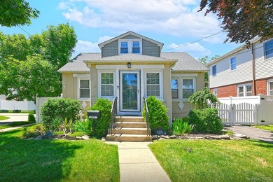 Welcome to this beautifully updated Cape Cod situated on a - photo 2