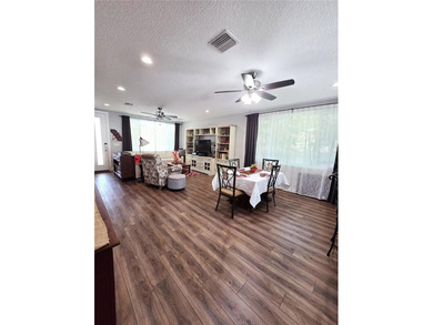 Welcome home to this beautifully maintained 2019 Pinellas Park - photo 3