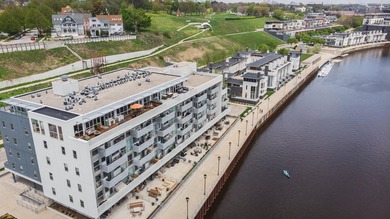 River and skyline views set the tone from your private balcony - photo 14