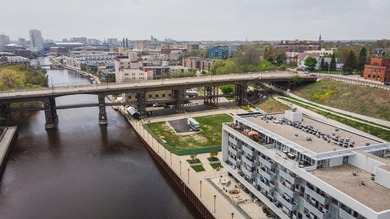 River and skyline views set the tone from your private balcony - photo 16