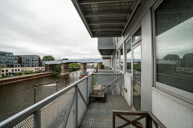 River and skyline views set the tone from your private balcony - photo 18