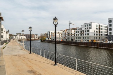 River and skyline views set the tone from your private balcony - photo 19