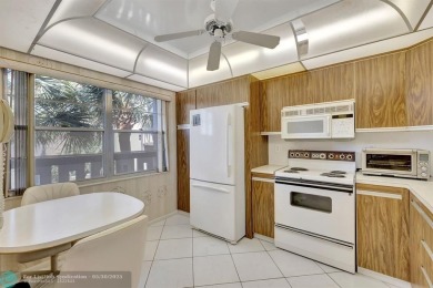 Lake Condo For Sale in Coconut Creek, Florida
