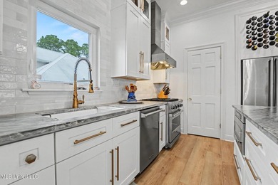 Welcome to this meticulously reimagined waterfront retreat in - photo 19