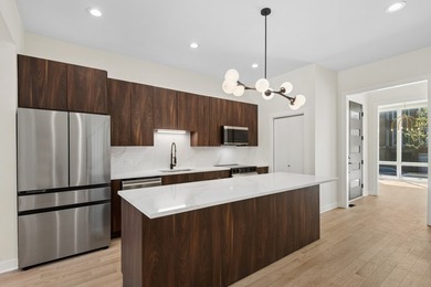 Move-in ready new construction at The Kenwood Reserve, an - photo 9