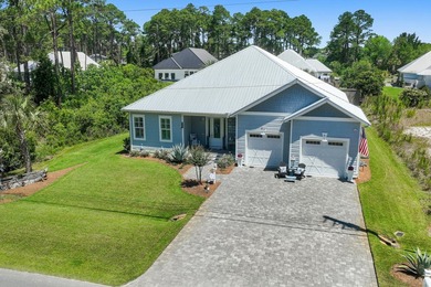 Escape to effortless coastal living in this bright and airy - photo 3