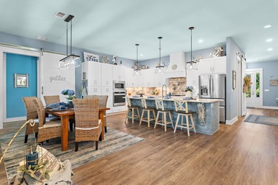 Escape to effortless coastal living in this bright and airy - photo 7