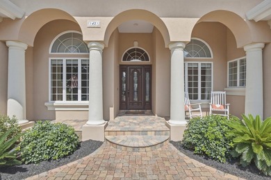 Nestled within the gated community of Soundside Shores, this - photo 4