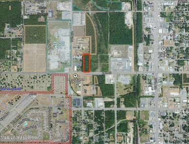 3.2 acres of undeveloped commercial property positioned along a - photo 1