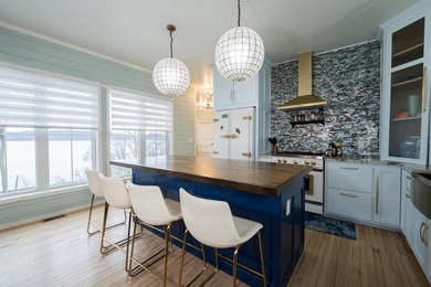 Stunning lake view luxury estate with dual living potential! - photo 13