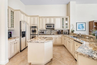 Discover luxury living in Palm Cove Golf & Yacht Club in this - photo 16