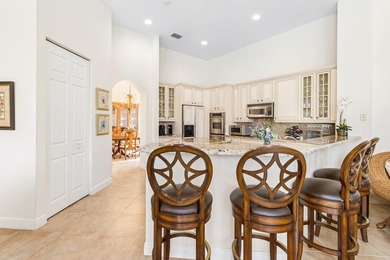 Discover luxury living in Palm Cove Golf & Yacht Club in this - photo 19