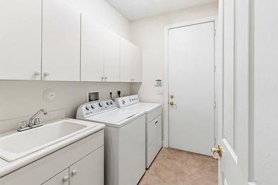 Discover luxury living in Palm Cove Golf & Yacht Club in this - photo 33