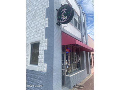 Rare opportunity to own a historic commercial building on the - photo 1