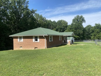 Nice well-kept countryside home in Knifley, Kentucky! This brick - photo 1