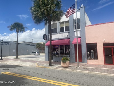 Rare opportunity to own a historic commercial building on the - photo 2