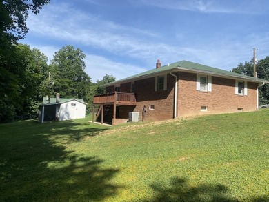 Nice well-kept countryside home in Knifley, Kentucky! This brick - photo 2