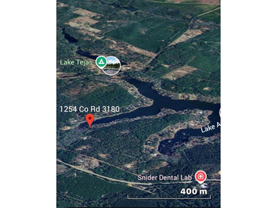 Waterfront lot on Lake Amanda with existing improvements - photo 7