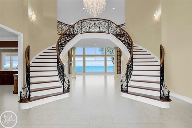 Welcome to an unparalleled lakefront estate offering 150 feet of - photo 9