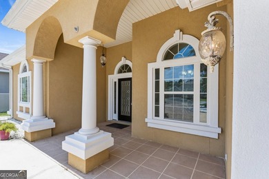 Located in the sought-after Winding River community, this - photo 2