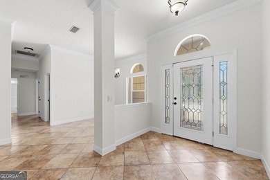 Located in the sought-after Winding River community, this - photo 3