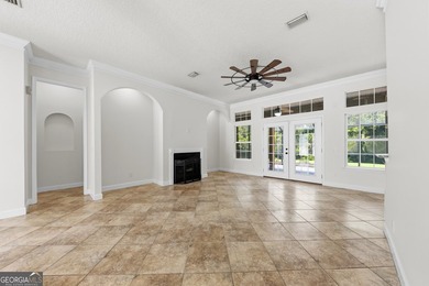 Located in the sought-after Winding River community, this - photo 4
