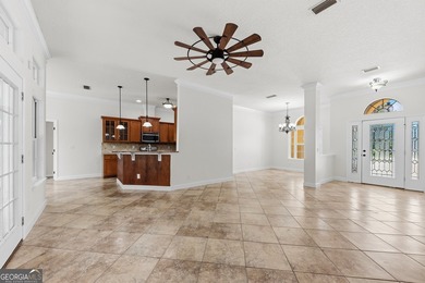 Located in the sought-after Winding River community, this - photo 5