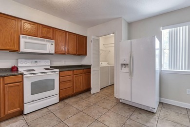 As you step inside you'll find tile floors flowing through the - photo 8