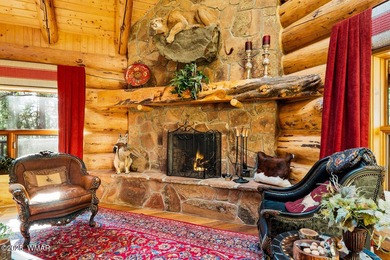 Incredibly rare full log home on the 15th fairway of the - photo 14