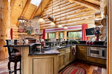 Incredibly rare full log home on the 15th fairway of the - photo 17