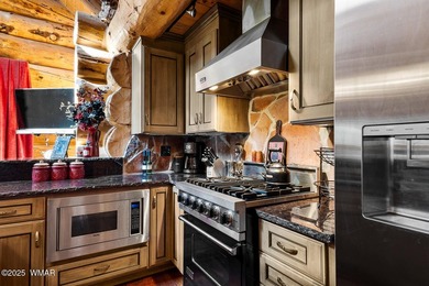 Incredibly rare full log home on the 15th fairway of the - photo 18