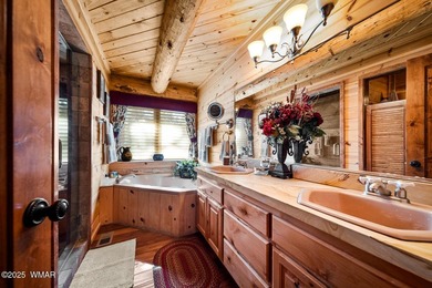 Incredibly rare full log home on the 15th fairway of the - photo 24
