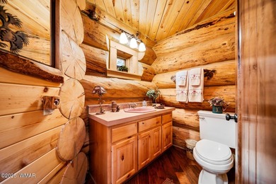 Incredibly rare full log home on the 15th fairway of the - photo 27