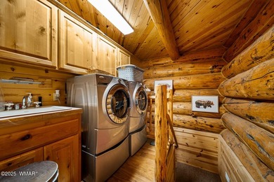 Incredibly rare full log home on the 15th fairway of the - photo 36