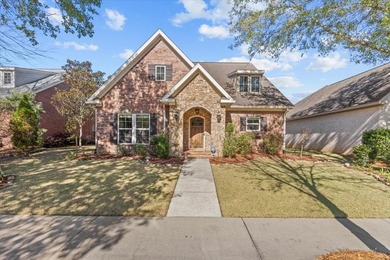 Tucked inside the Village of Highlands South, this 4-bedroom