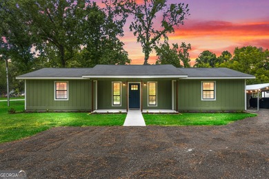 Beautifully remodeled and move-in ready, this 3-bedroom, 2-bath - photo 1