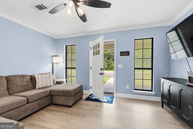 Beautifully remodeled and move-in ready, this 3-bedroom, 2-bath - photo 2
