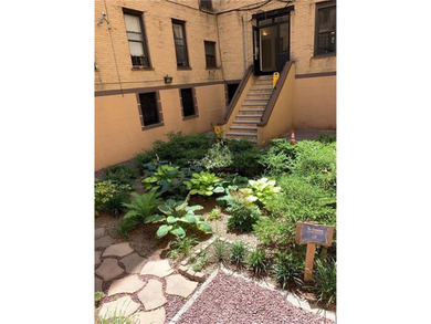 This spacious two bedroom and one full bathroom condo is newly - photo 14