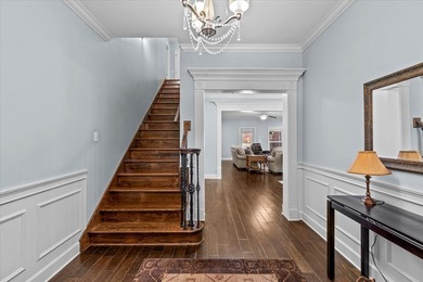 Tucked inside the Village of Highlands South, this 4-bedroom