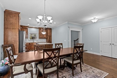 Tucked inside the Village of Highlands South, this 4-bedroom