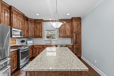 Tucked inside the Village of Highlands South, this 4-bedroom