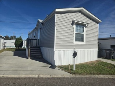 Own your own home in a quiet, well-maintained neighborhood! This - photo 1
